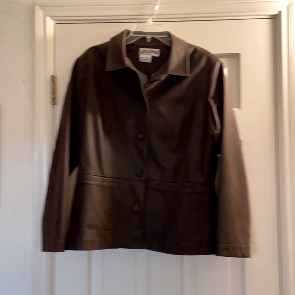 Faux leather jacket it is practically new. I worked in a boutique